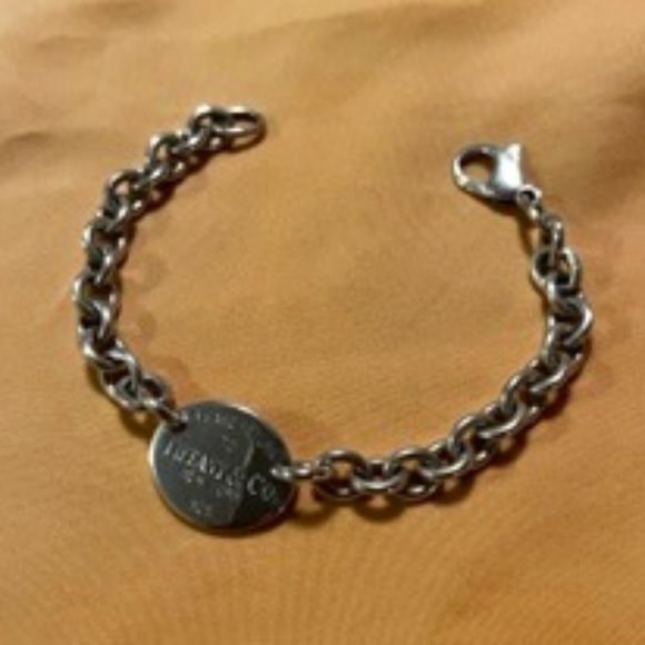 Tiffany & Co. Jewelry - Tiffany Chain Link Bracelet with Oval Tiffany Signature Mark and 925
